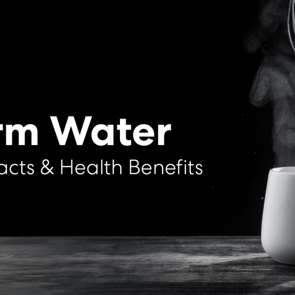 Warm water being poured from a kettle into a white mug with steam rising, alongside the text “Warm Water: Myths, Facts & Health Benefits” on a dark background.